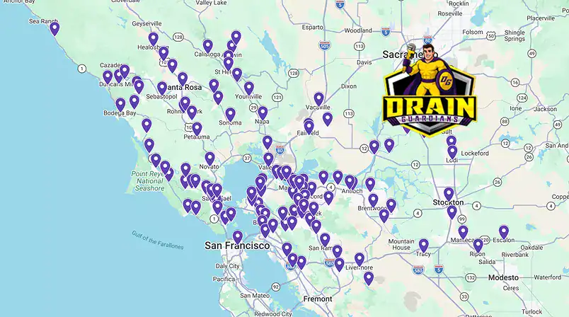 A map of Northern California with numerous purple location markers, focused around San Francisco and Sacramento, with a “Drain Guardians” superhero logo on the right.